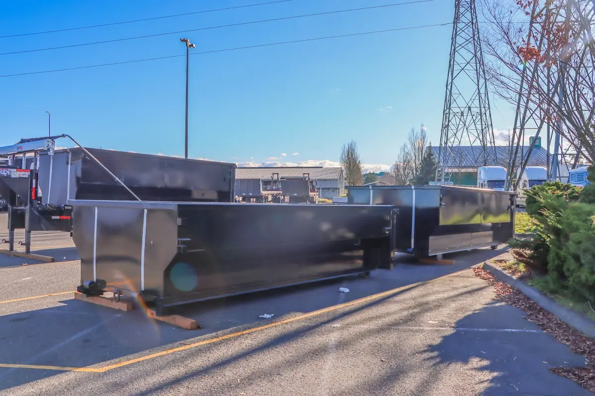 Roll-off dumpster ready for waste disposal at job site for Commercial Dumpster Rental in Grove